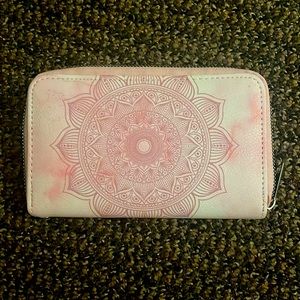 Pink color leather at wallet brand new never used zipper coin pouch inside.